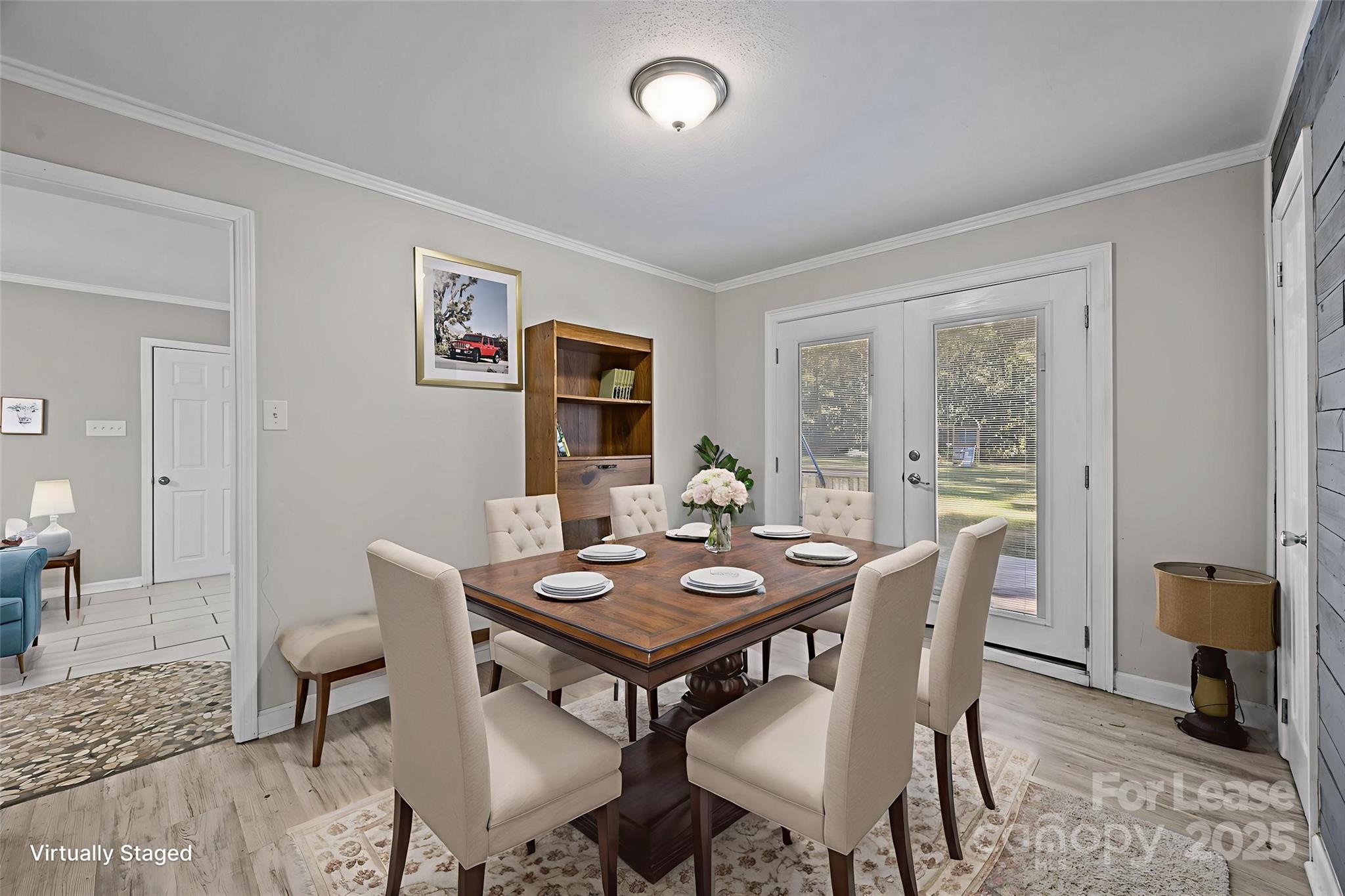 10751 Ola Drive Fort Mill, SC 29707 - Photo 9 of 22 a view of a dining room with furniture window and wooden floor