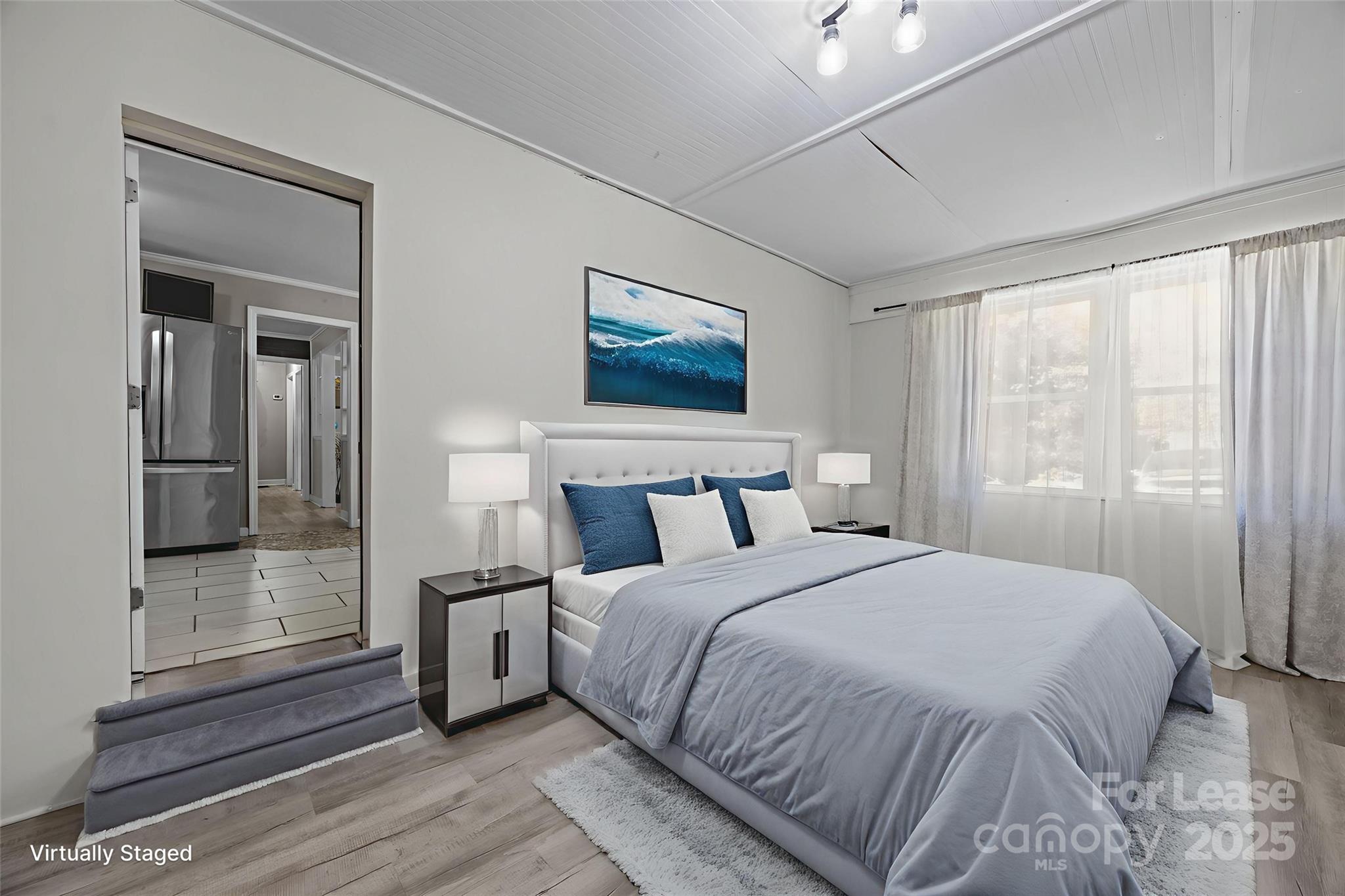 10751 Ola Drive Fort Mill, SC 29707 - Photo 10 of 22 a bedroom with a bed and a mirror