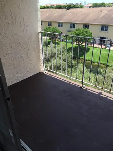 a view of backyard with green space