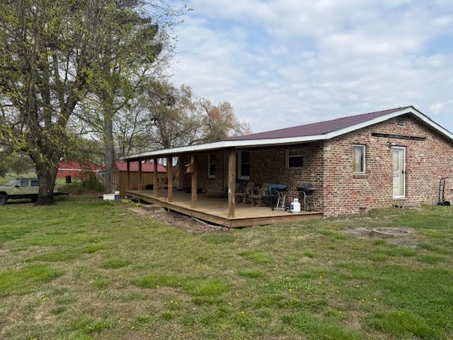 166 Indiana Avenue Ethridge, TN 38456 - Photo 1 of 18 a view of a house with a yard and sitting area