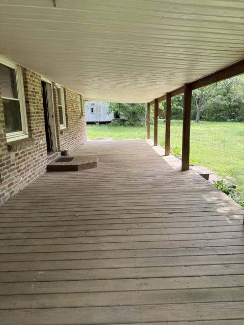 166 Indiana Avenue Ethridge, TN 38456 - Photo 5 of 18 a view of a living room and floor to ceiling window