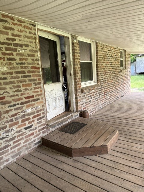 166 Indiana Avenue Ethridge, TN 38456 - Photo 6 of 18 a view of a brick house with white door