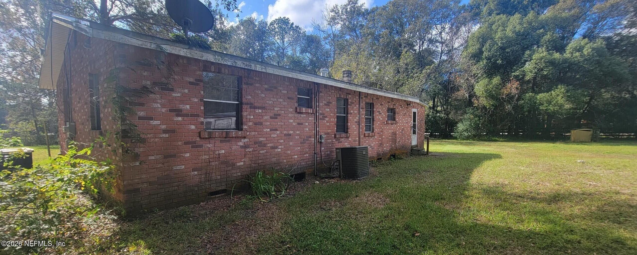 10593 Joes Road Jacksonville, FL 32221 - Photo 2 of 3 a view of backyard with green space