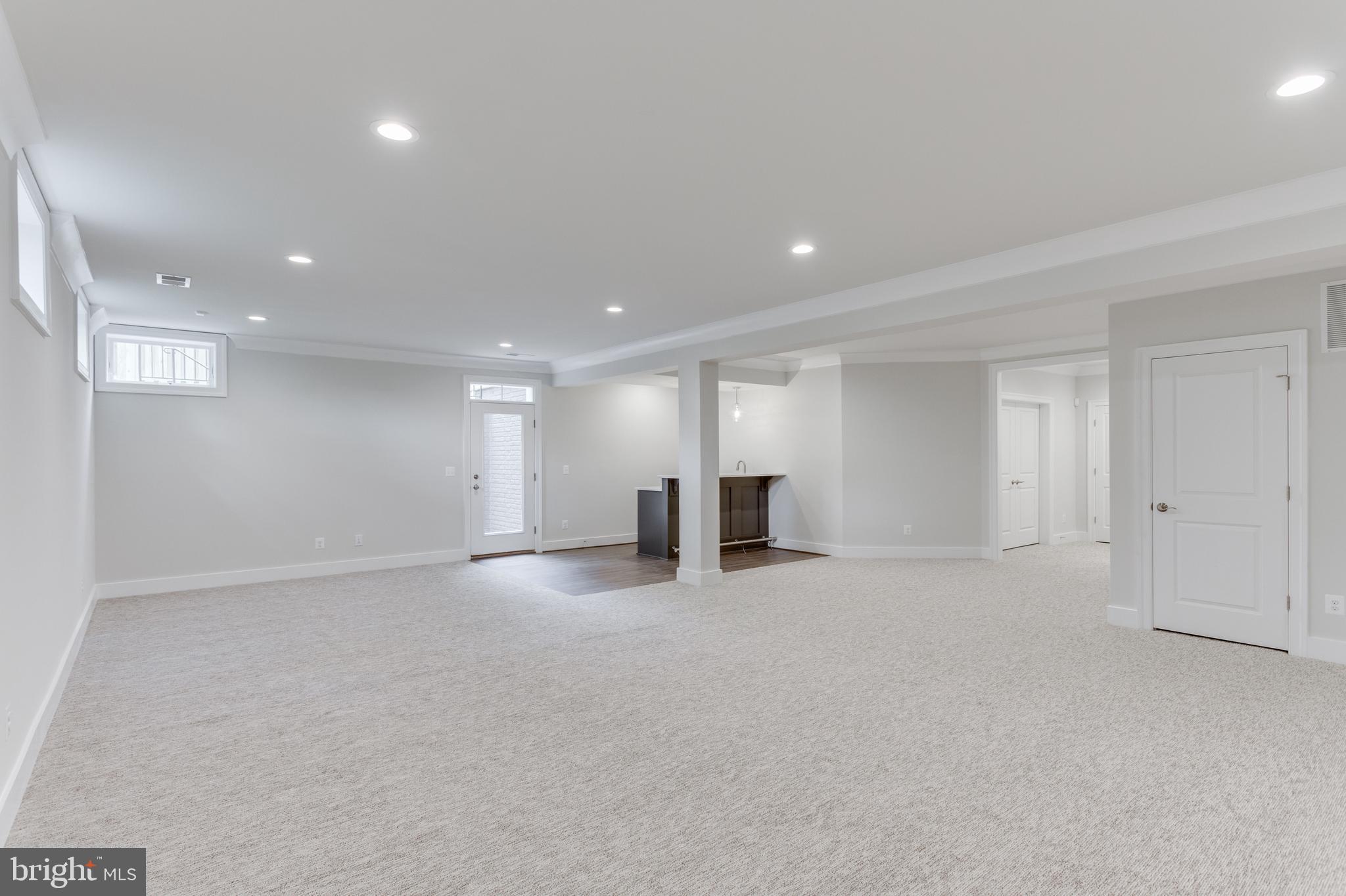 305 Cabin Road Southeast Vienna, VA 22180 - Photo 22 of 25 FINISHED LOWER LEVEL WITH WET BAR.