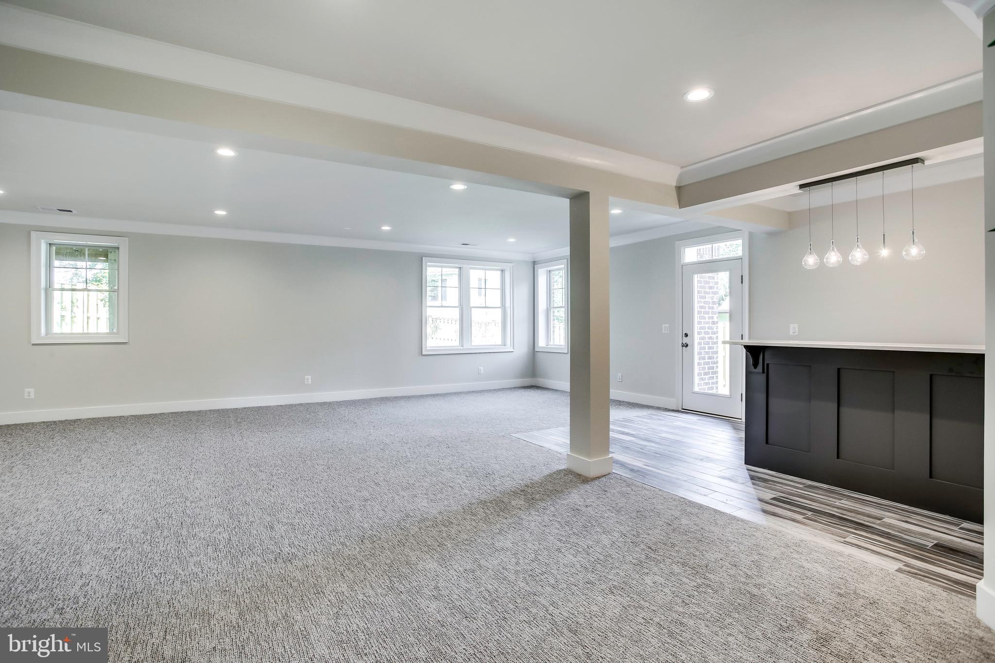 305 Cabin Road Southeast Vienna, VA 22180 - Photo 23 of 25 FINISHED LOWER LEVEL WITH WET BAR.