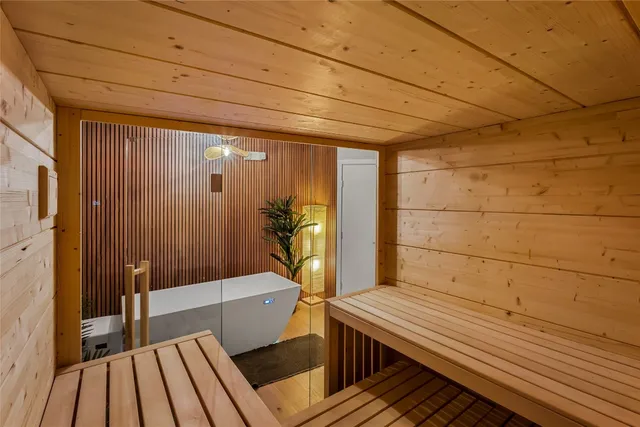 a bathroom with a bathtub and shower