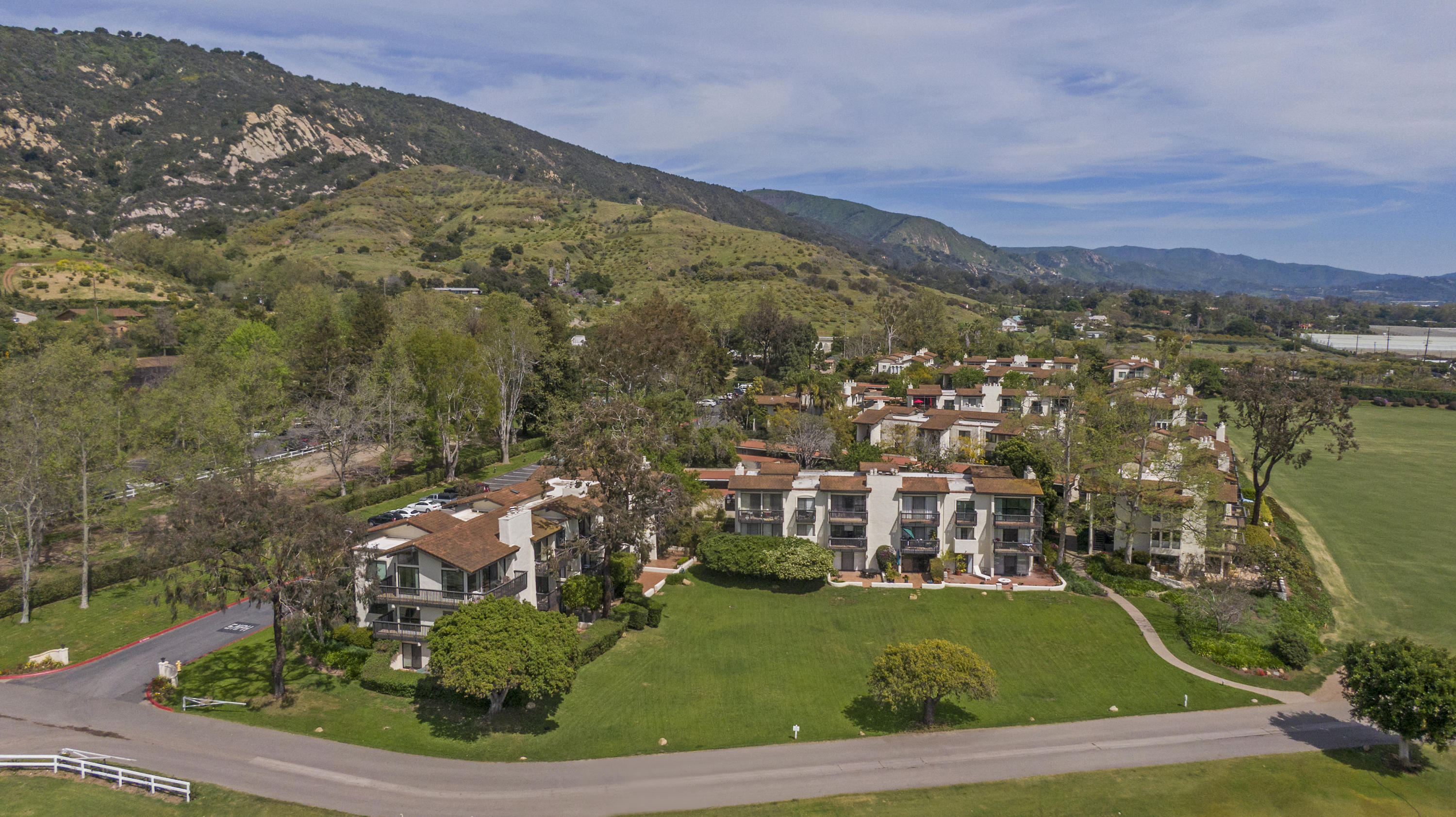 3375 Foothill Road, Unit 1012 Carpinteria, CA 93013 - Photo 11 of 15 an aerial view of residential houses with outdoor space and lake view