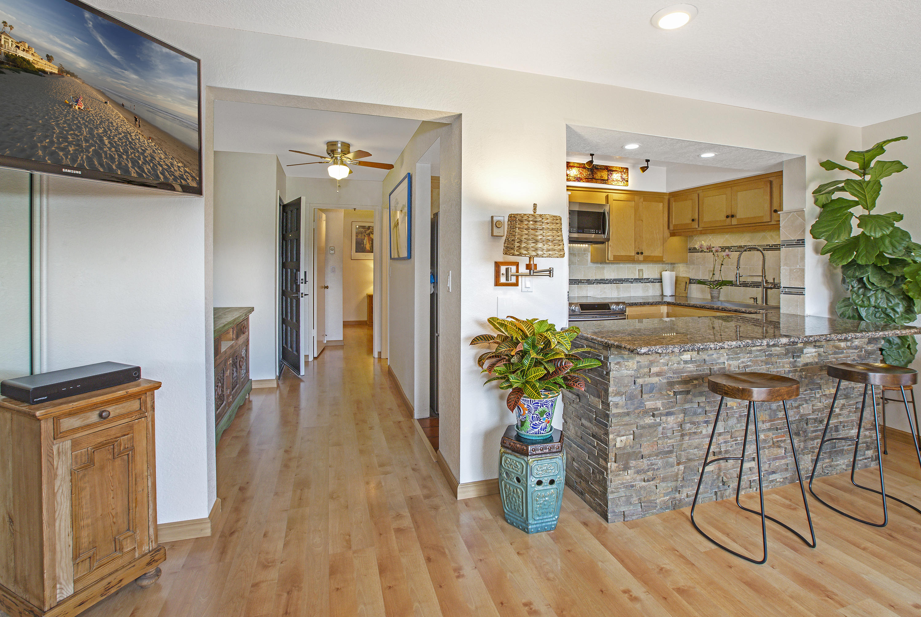3375 Foothill Road, Unit 1012 Carpinteria, CA 93013 - Photo 5 of 15 a lobby with furniture and wooden floor