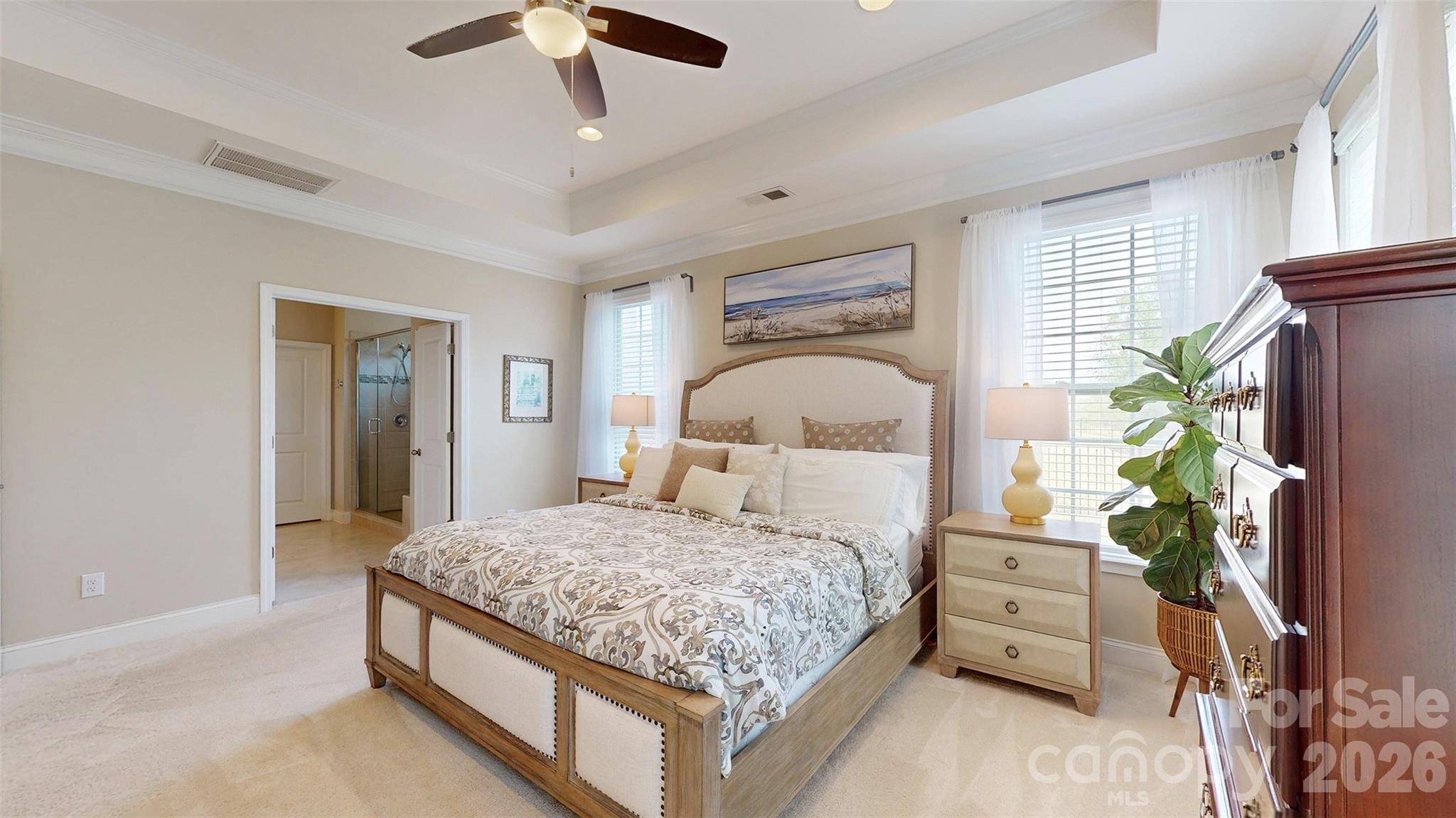 3036 Bridgewater Street Lancaster, SC 29720 - Photo 17 of 41 a bedroom with a large bed and a potted plant