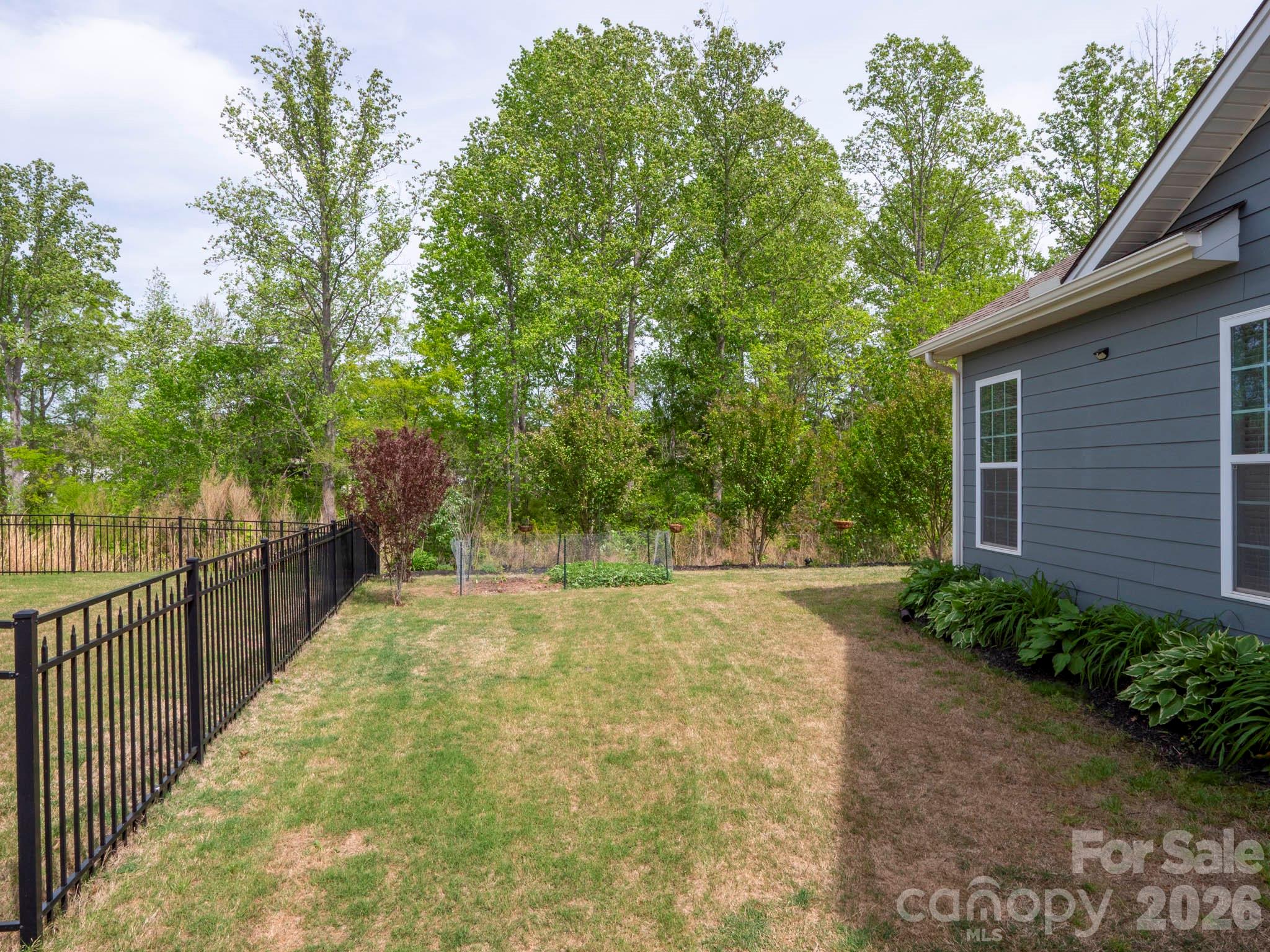 3036 Bridgewater Street Lancaster, SC 29720 - Photo 26 of 41 a view of a backyard with pathway