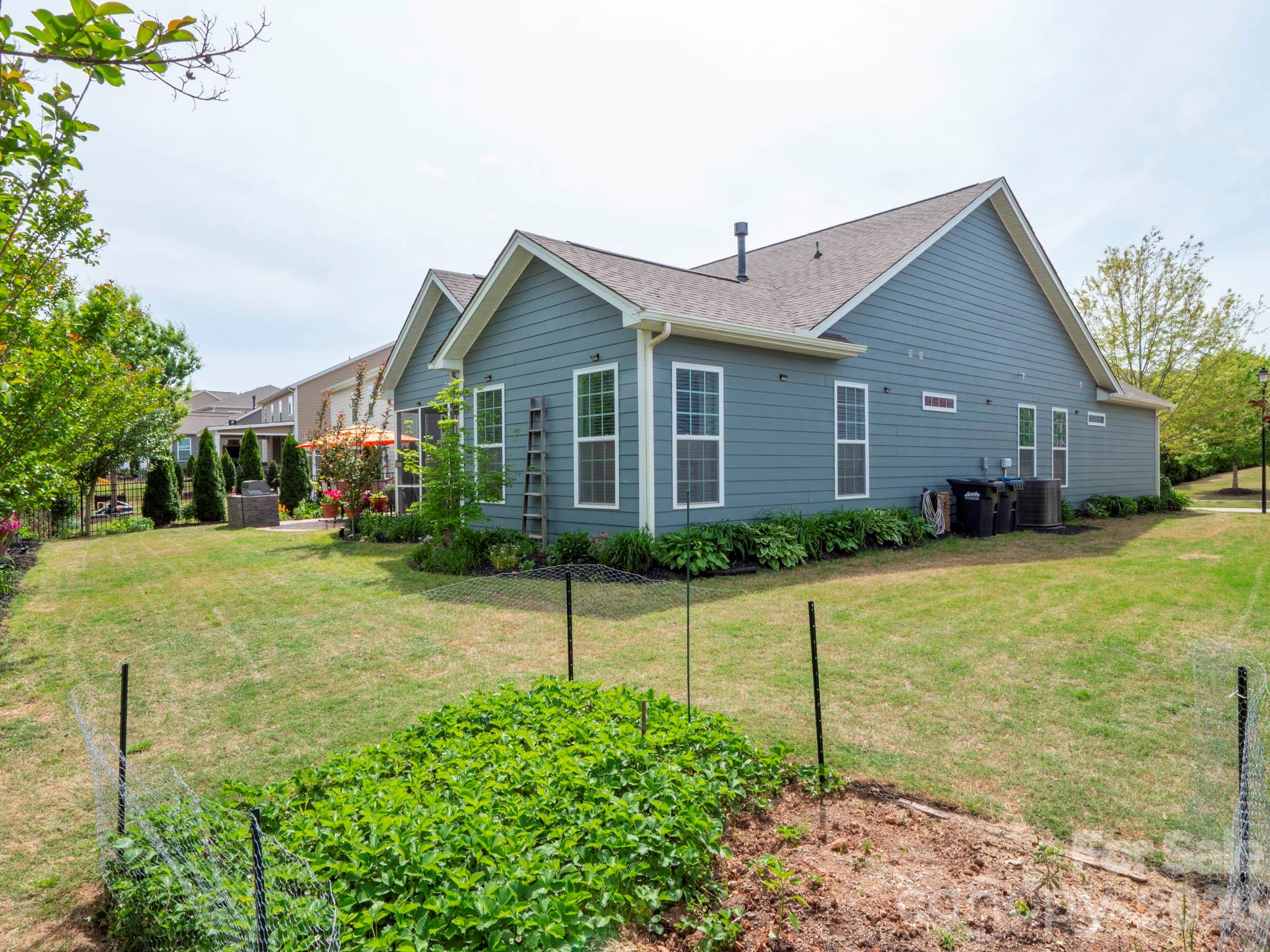 3036 Bridgewater Street Lancaster, SC 29720 - Photo 28 of 41 a front view of house with a yard and trees