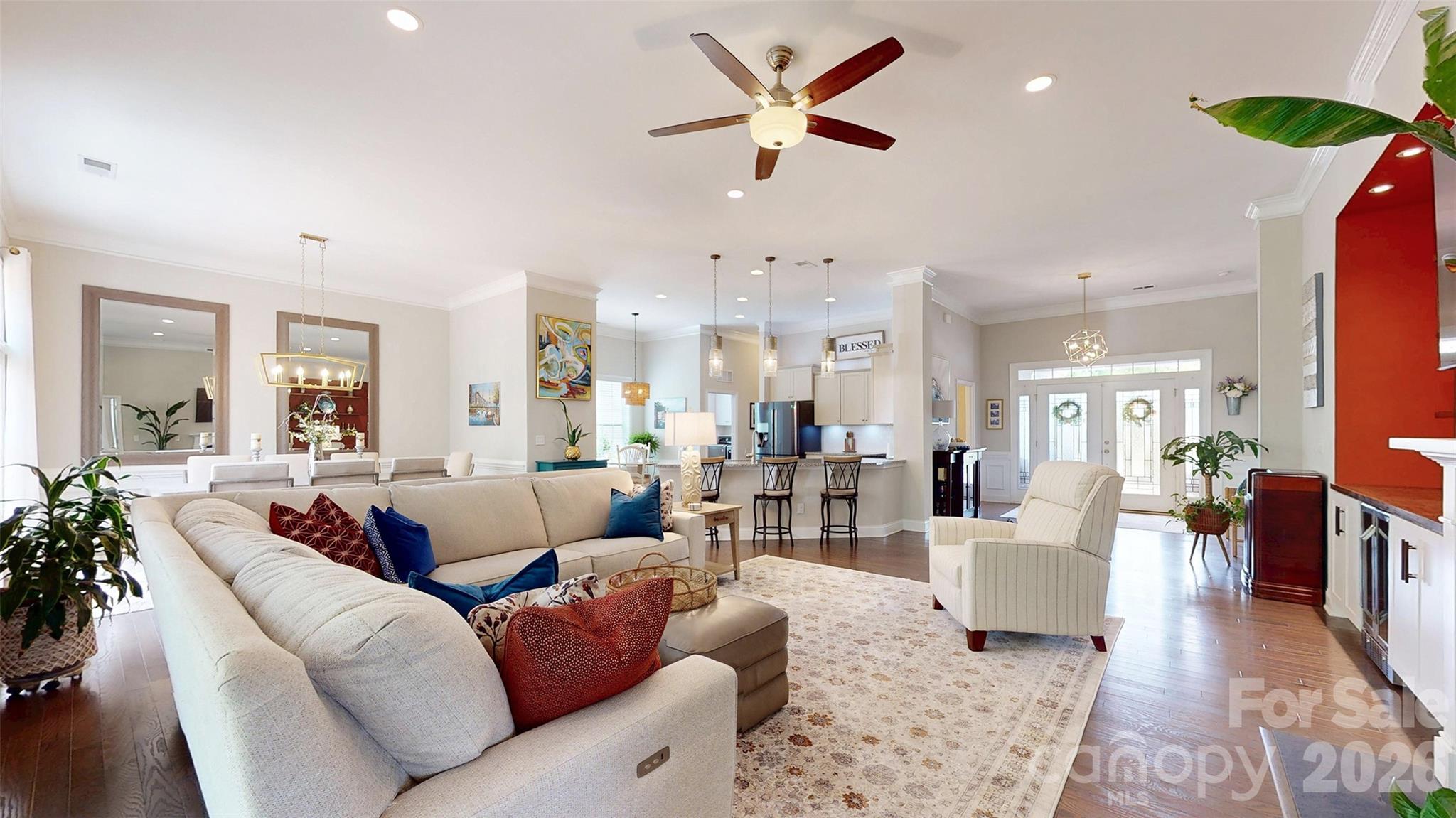 3036 Bridgewater Street Lancaster, SC 29720 - Photo 7 of 41 a living room with furniture or wooden floor and a chandelier