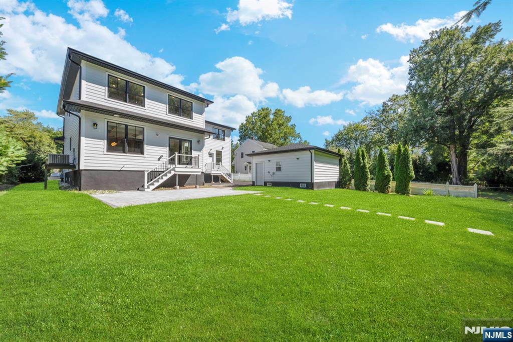 326 Northern Parkway Ridgewood, NJ 07450 - Photo 2 of 47 a front view of house with yard and seating area
