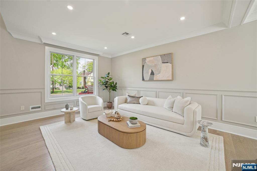 326 Northern Parkway Ridgewood, NJ 07450 - Photo 22 of 30 a living room with furniture and a large window