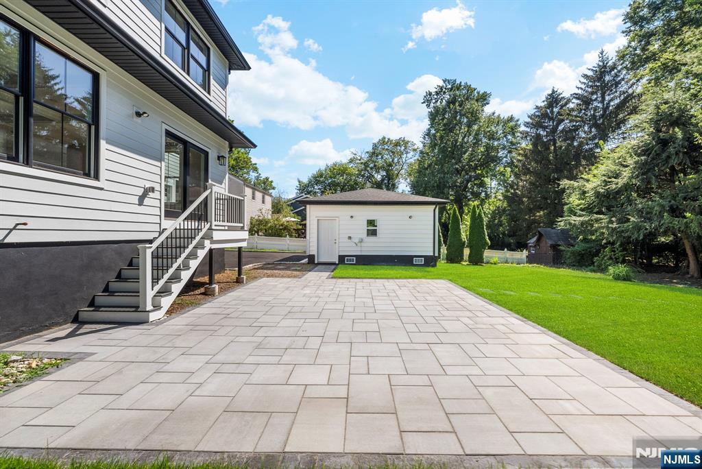 326 Northern Parkway Ridgewood, NJ 07450 - Photo 26 of 30 a view of a house with a yard