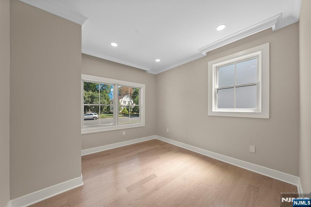 326 Northern Parkway Ridgewood, NJ 07450 - Photo 32 of 47 an empty room with windows and closet