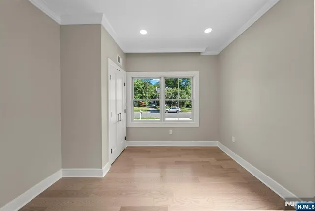 a view of a hallway with a window