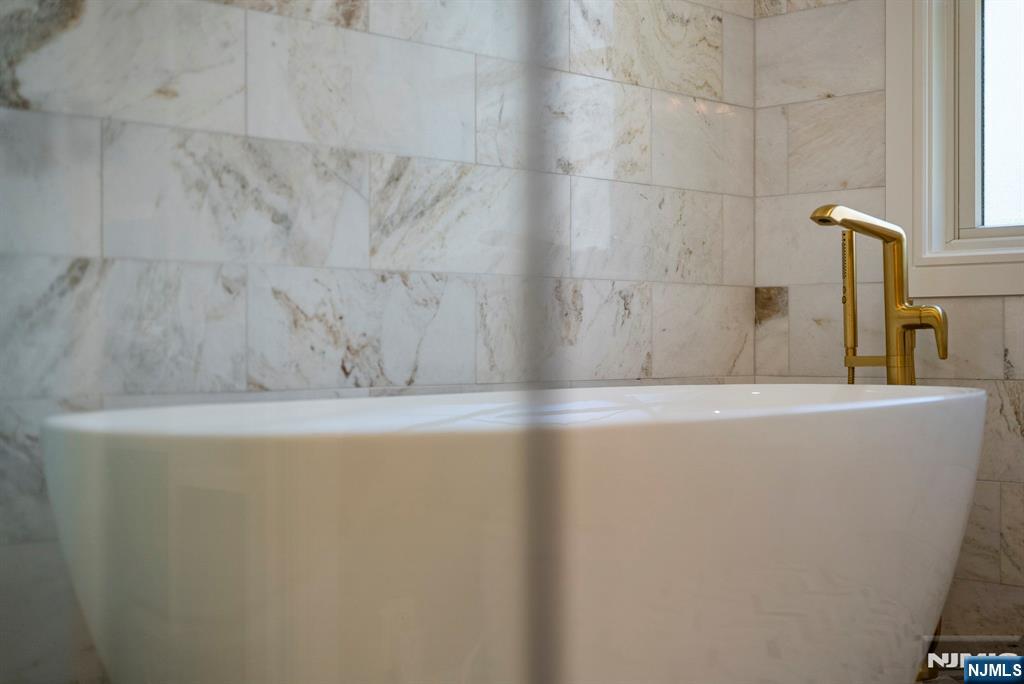 326 Northern Parkway Ridgewood, NJ 07450 - Photo 44 of 47 a view of a bathtub in a bathroom