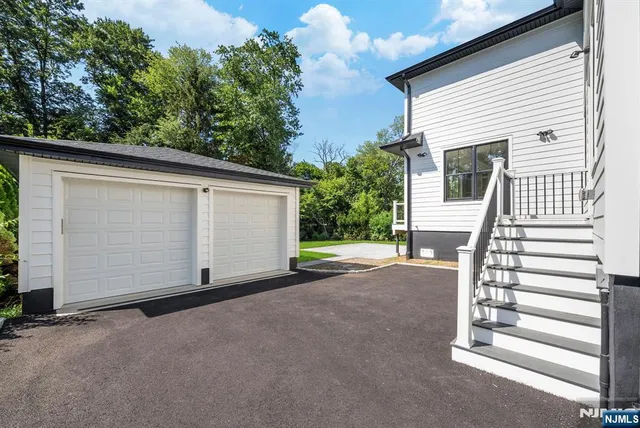 a view of a house with a garage