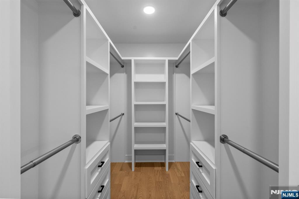 326 Northern Parkway Ridgewood, NJ 07450 - Photo 8 of 47 a view of walk in closet with empty racks