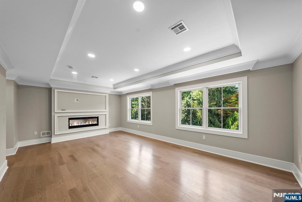 326 Northern Parkway Ridgewood, NJ 07450 - Photo 10 of 47 an empty room with windows and fireplace