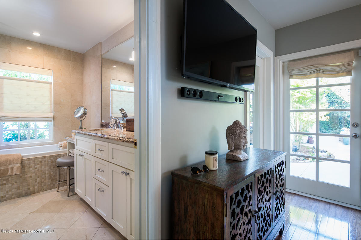 72 Annandale Road Pasadena, CA 91105 - Photo 22 of 45 a kitchen with stainless steel appliances granite countertop a stove a sink and a microwave