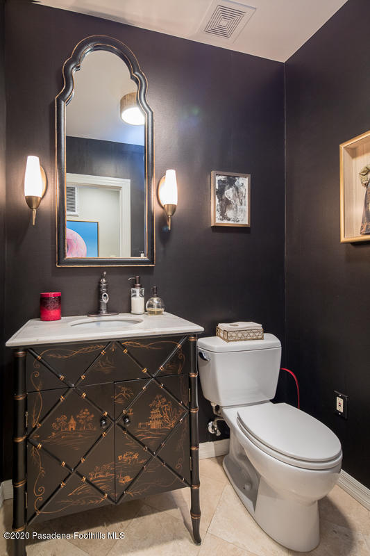 72 Annandale Road Pasadena, CA 91105 - Photo 30 of 45 a bathroom with a toilet a sink and mirror