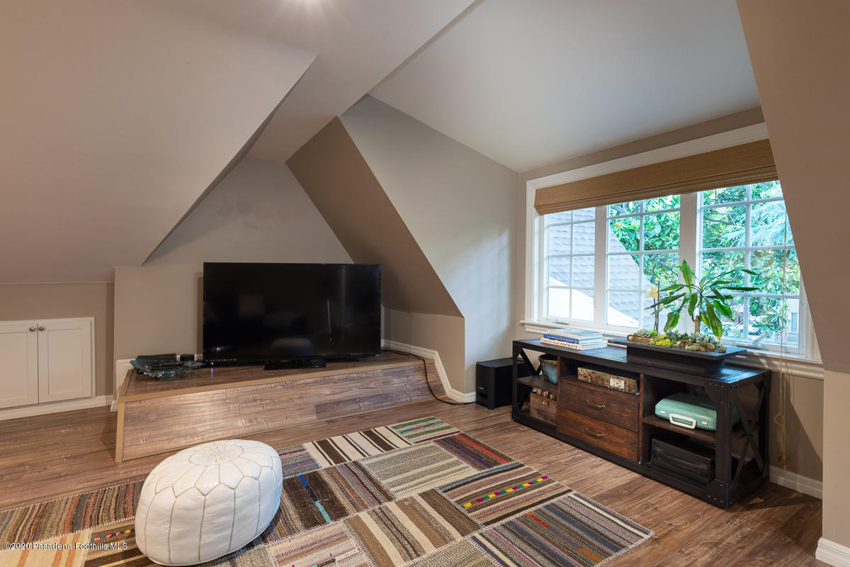 72 Annandale Road Pasadena, CA 91105 - Photo 35 of 45 a living room with furniture and a flat screen tv