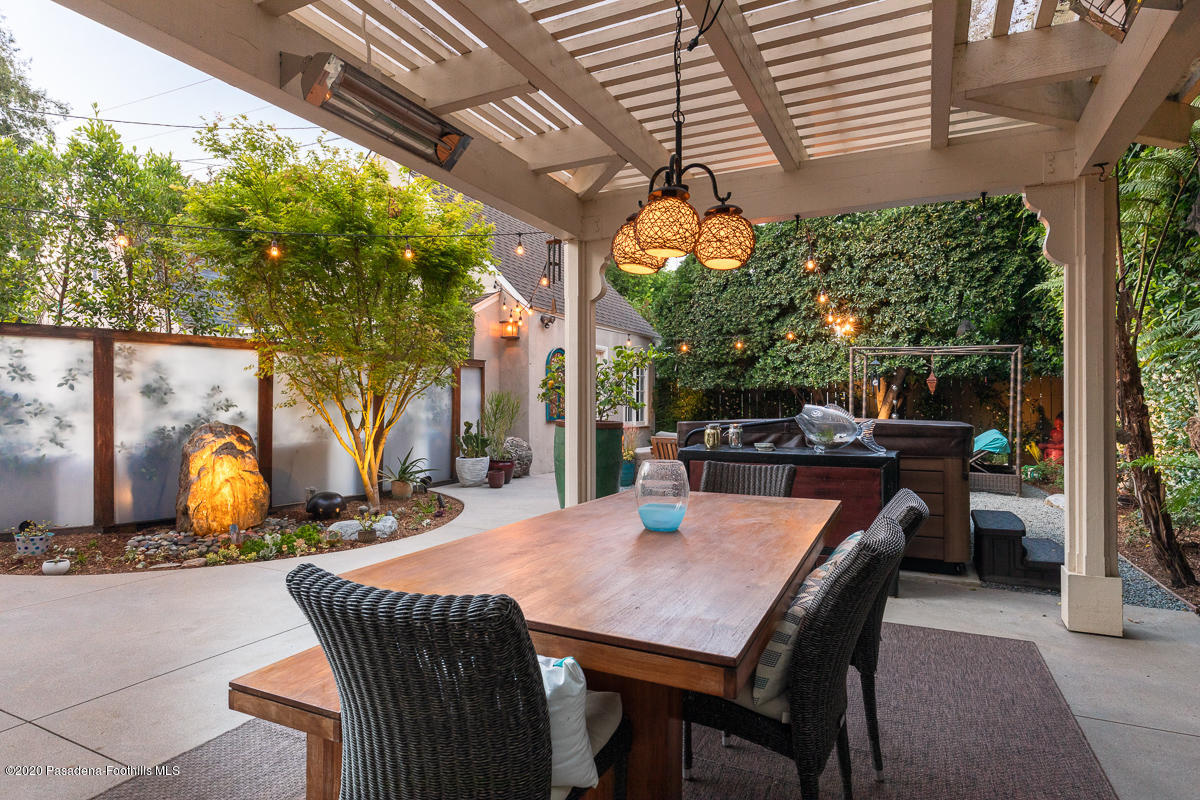 72 Annandale Road Pasadena, CA 91105 - Photo 41 of 45 a view of a patio with table and chairs and potted plants