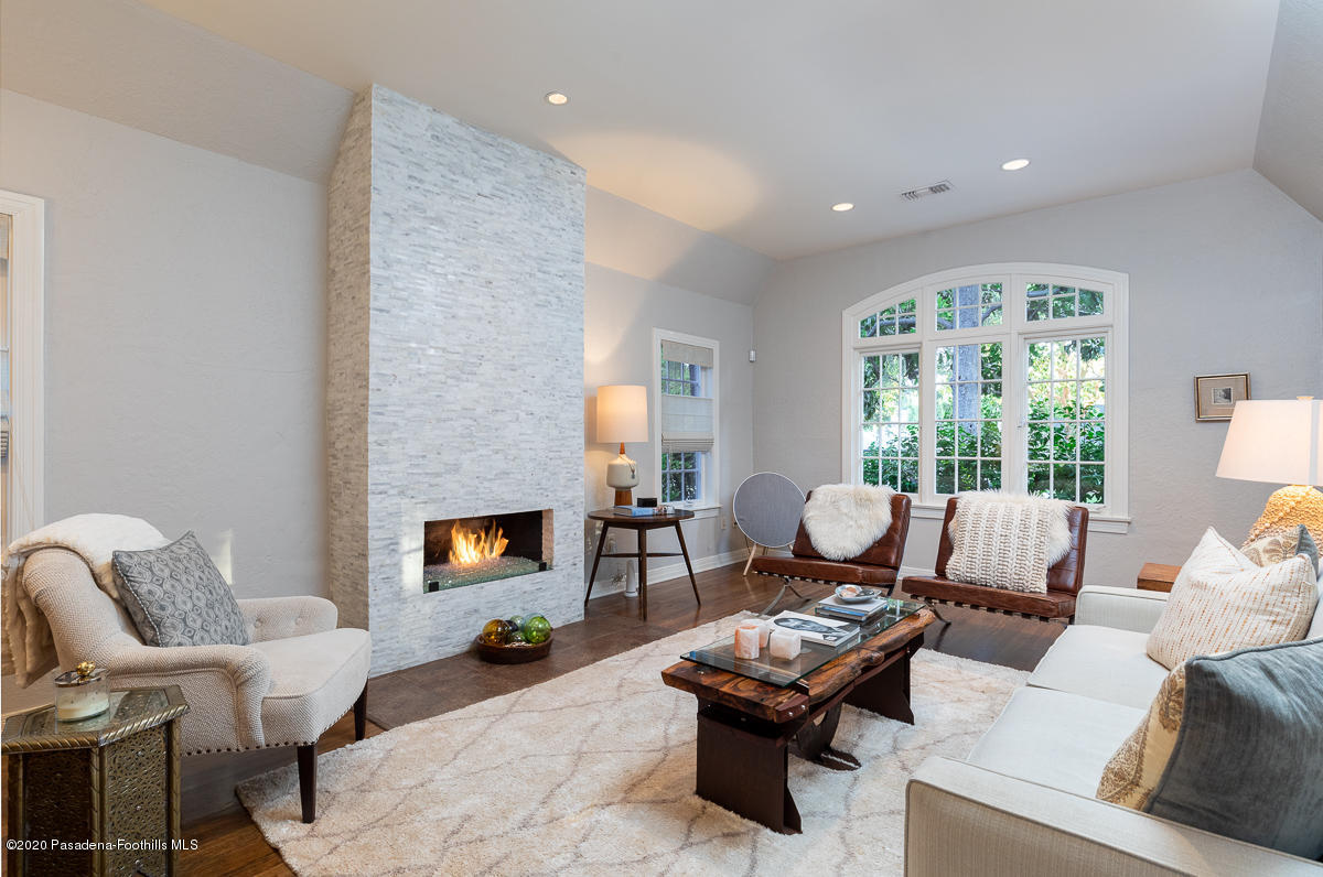 72 Annandale Road Pasadena, CA 91105 - Photo 7 of 45 a living room with furniture fireplace and a large window