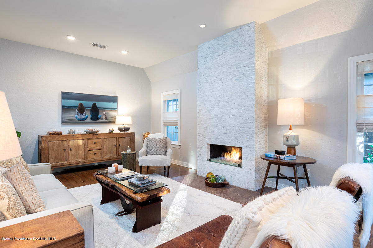 72 Annandale Road Pasadena, CA 91105 - Photo 8 of 45 a living room with furniture and a fireplace