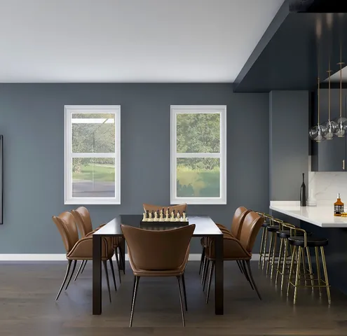 a view of a dining room with furniture and window