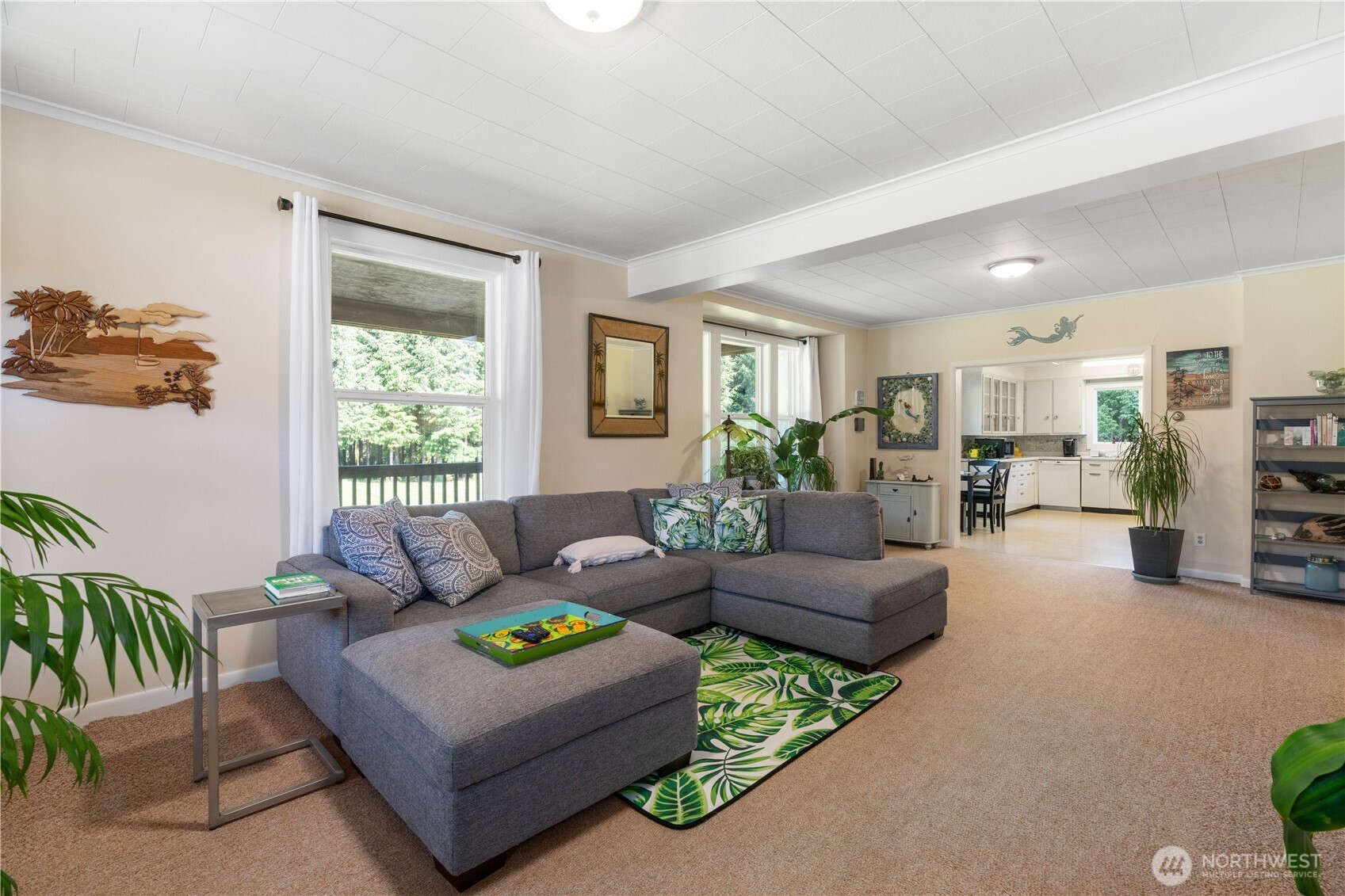 Undisclosed Address Forks, WA 98331 - Photo 12 of 39 a living room with furniture and a large window