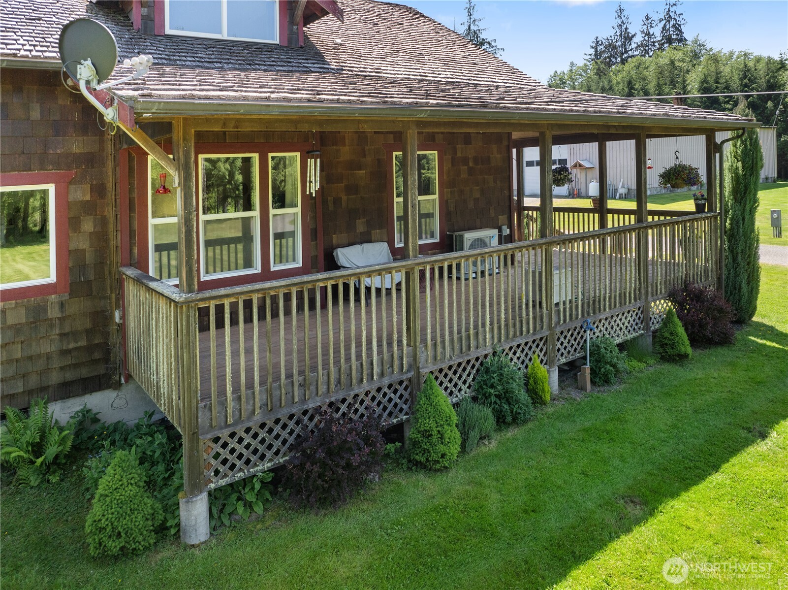 Undisclosed Address Forks, WA 98331 - Photo 16 of 40 a front view of a house with a garden