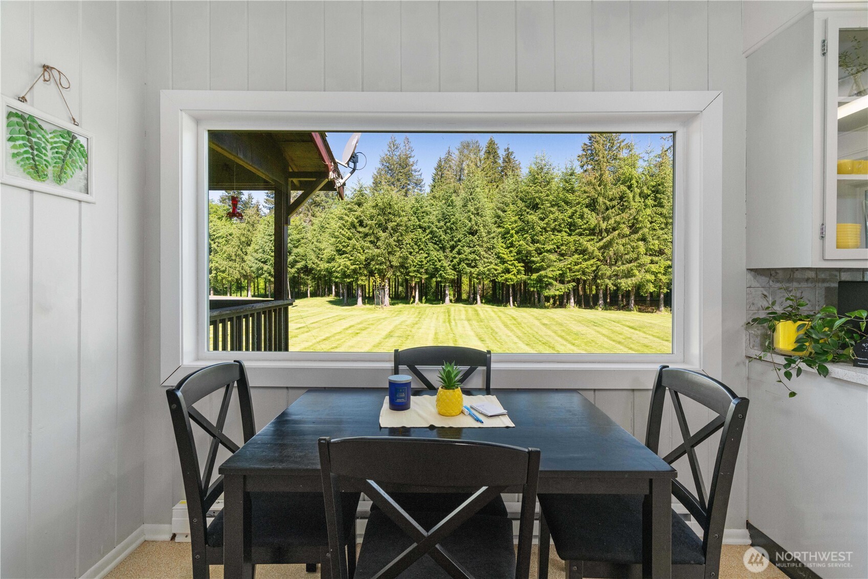 Undisclosed Address Forks, WA 98331 - Photo 21 of 40 a view of a dining room with furniture and a window