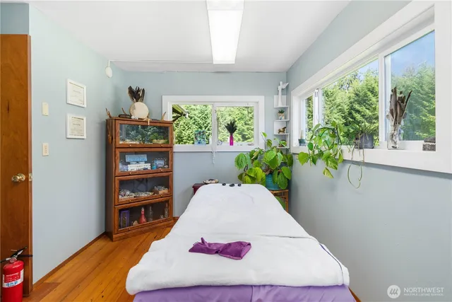 a view of a garage with a table and chairs
