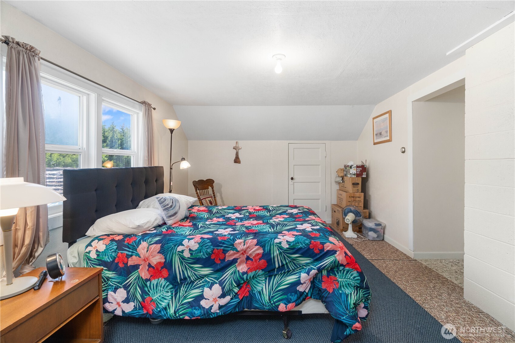 Undisclosed Address Forks, WA 98331 - Photo 32 of 40 a bedroom with bed and a window