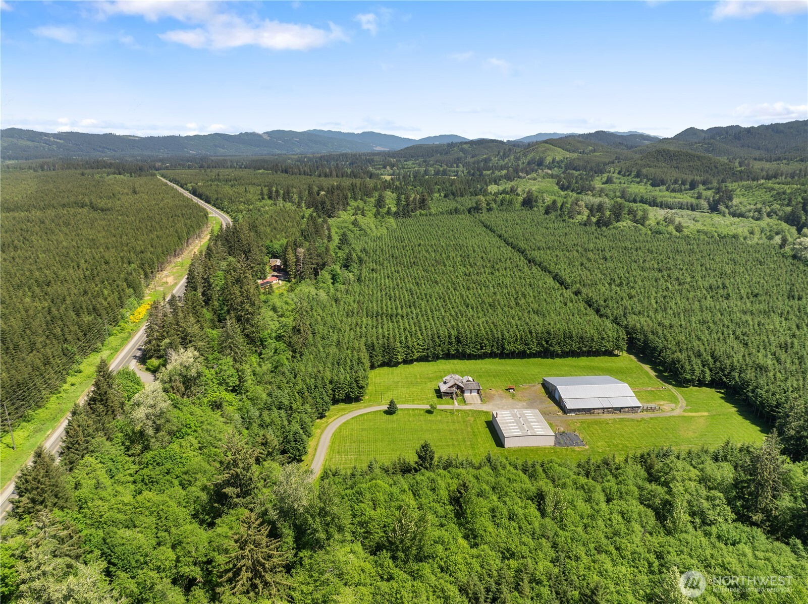 Undisclosed Address Forks, WA 98331 - Photo 6 of 39 a view of a swimming pool with a yard