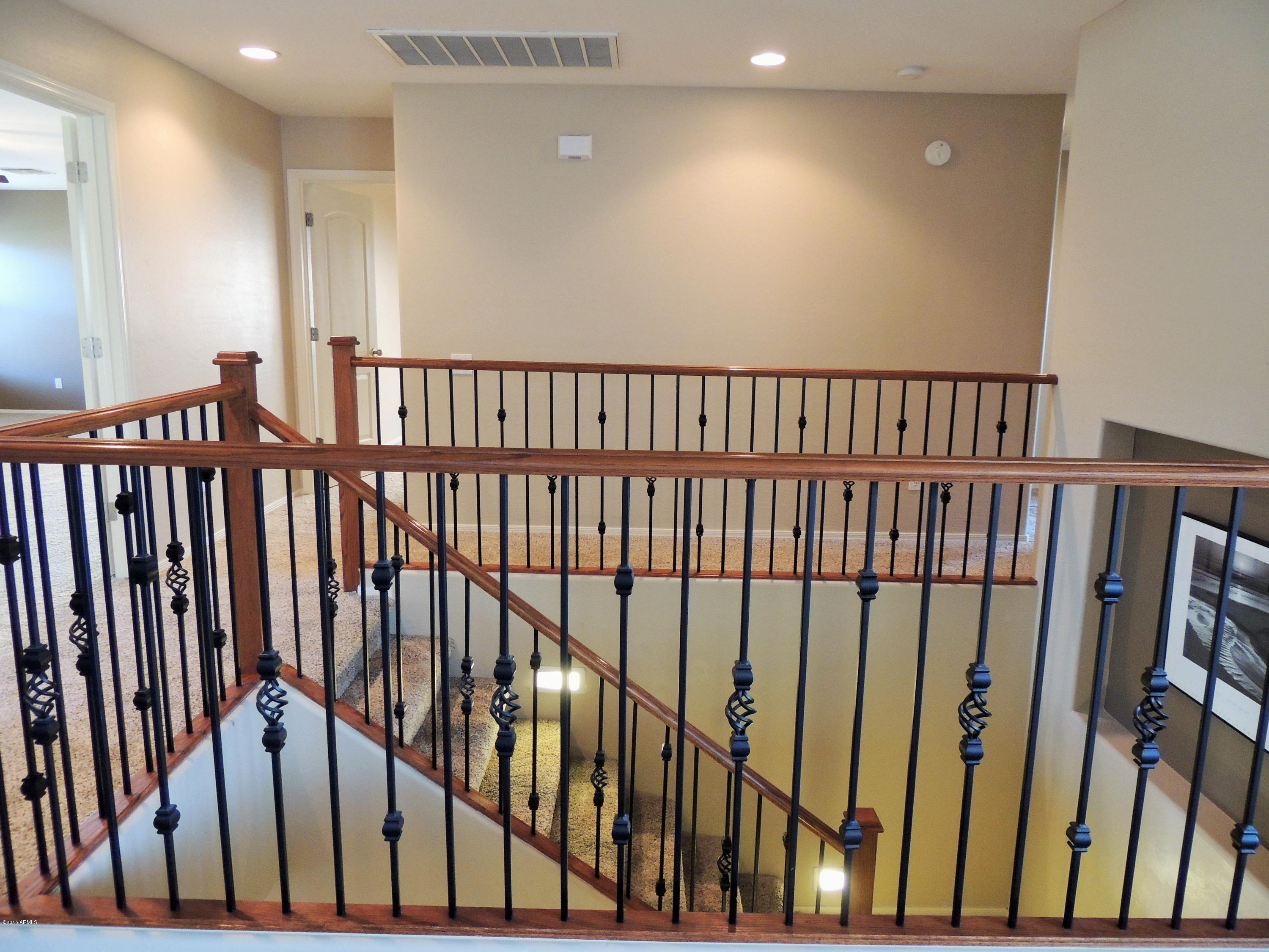 43266 West Magnolia Road Maricopa, AZ 85138 - Photo 24 of 34 Upgraded Stair Rails