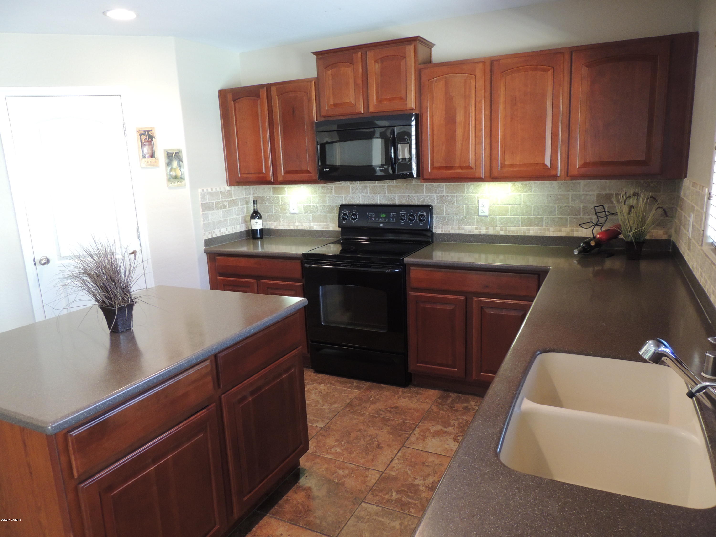 43266 West Magnolia Road Maricopa, AZ 85138 - Photo 6 of 34 Kitchen 3