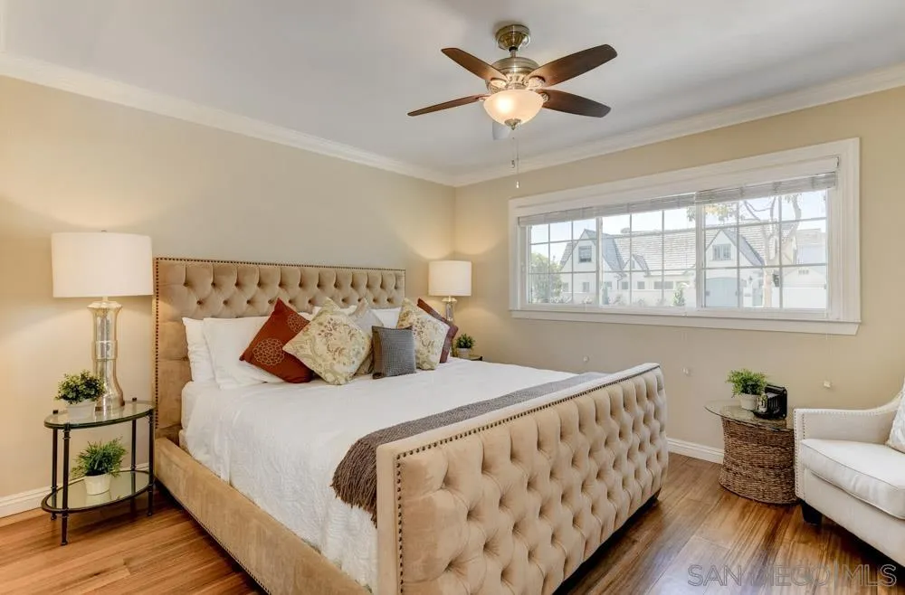 1221 4th Street Coronado, CA 92118 - Photo 12 of 24 a bedroom with a bed and a couch