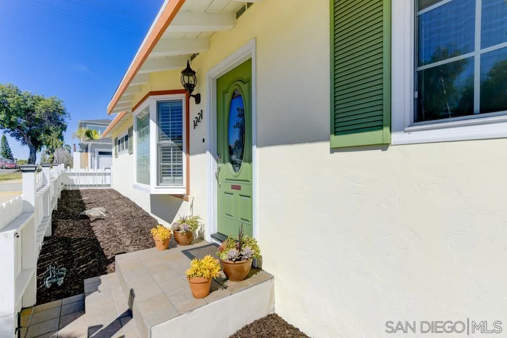 1221 4th Street Coronado, CA 92118 - Photo 2 of 24 front view of a house with a rug