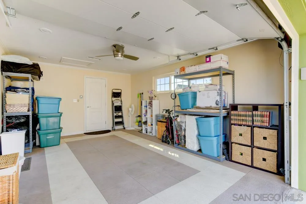 1221 4th Street Coronado, CA 92118 - Photo 21 of 24 a view of a room with cabinet cabinet and a flat screen tv