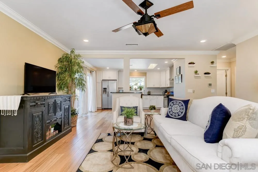 1221 4th Street Coronado, CA 92118 - Photo 5 of 24 a living room with furniture and a flat screen tv