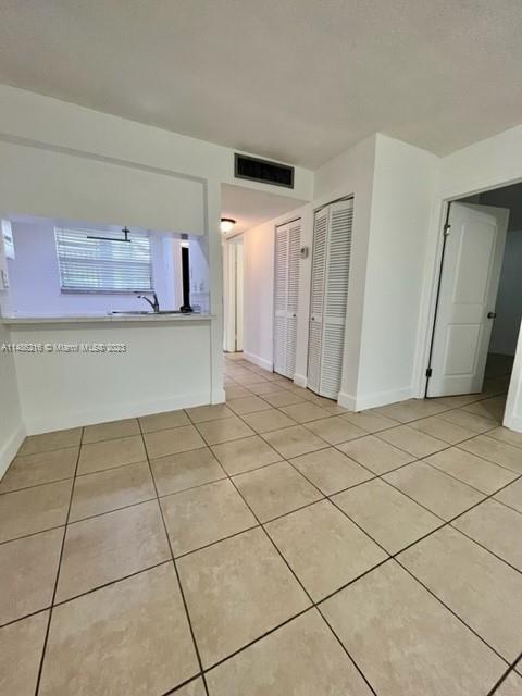 14155 Southwest 87th Street, Unit E310 Miami, FL 33183 - Photo 5 of 13 a view of a storage & utility room