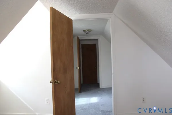 a view of a hallway with closet