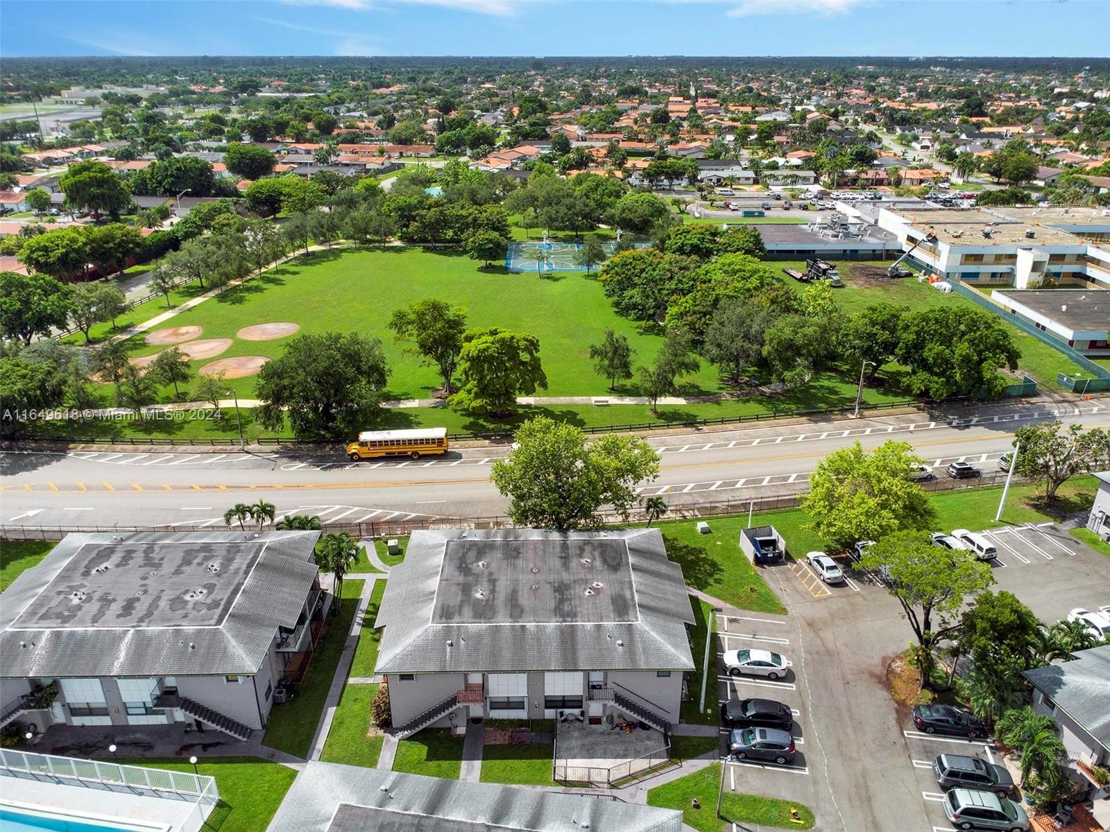 13240 Southwest 17th Lane, Unit 8 Miami, FL 33175 - Photo 13 of 14 an aerial view of multiple houses with yard