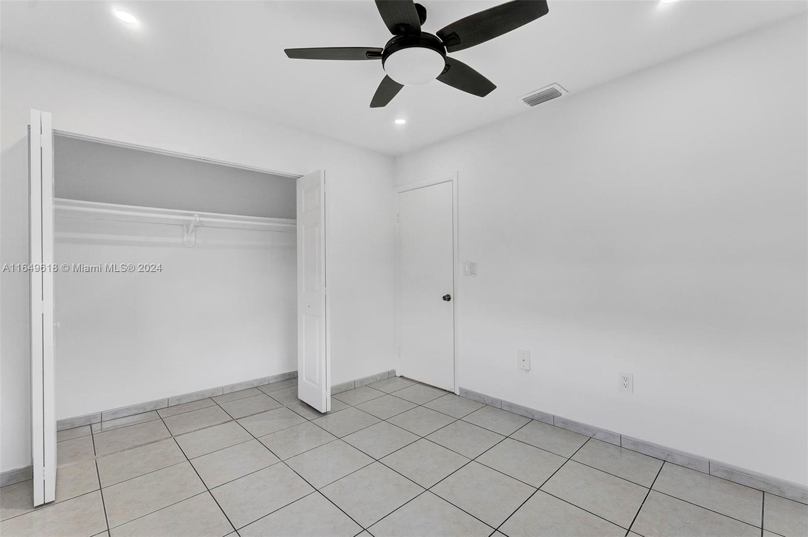 13240 Southwest 17th Lane, Unit 8 Miami, FL 33175 - Photo 8 of 14 a view of an empty room