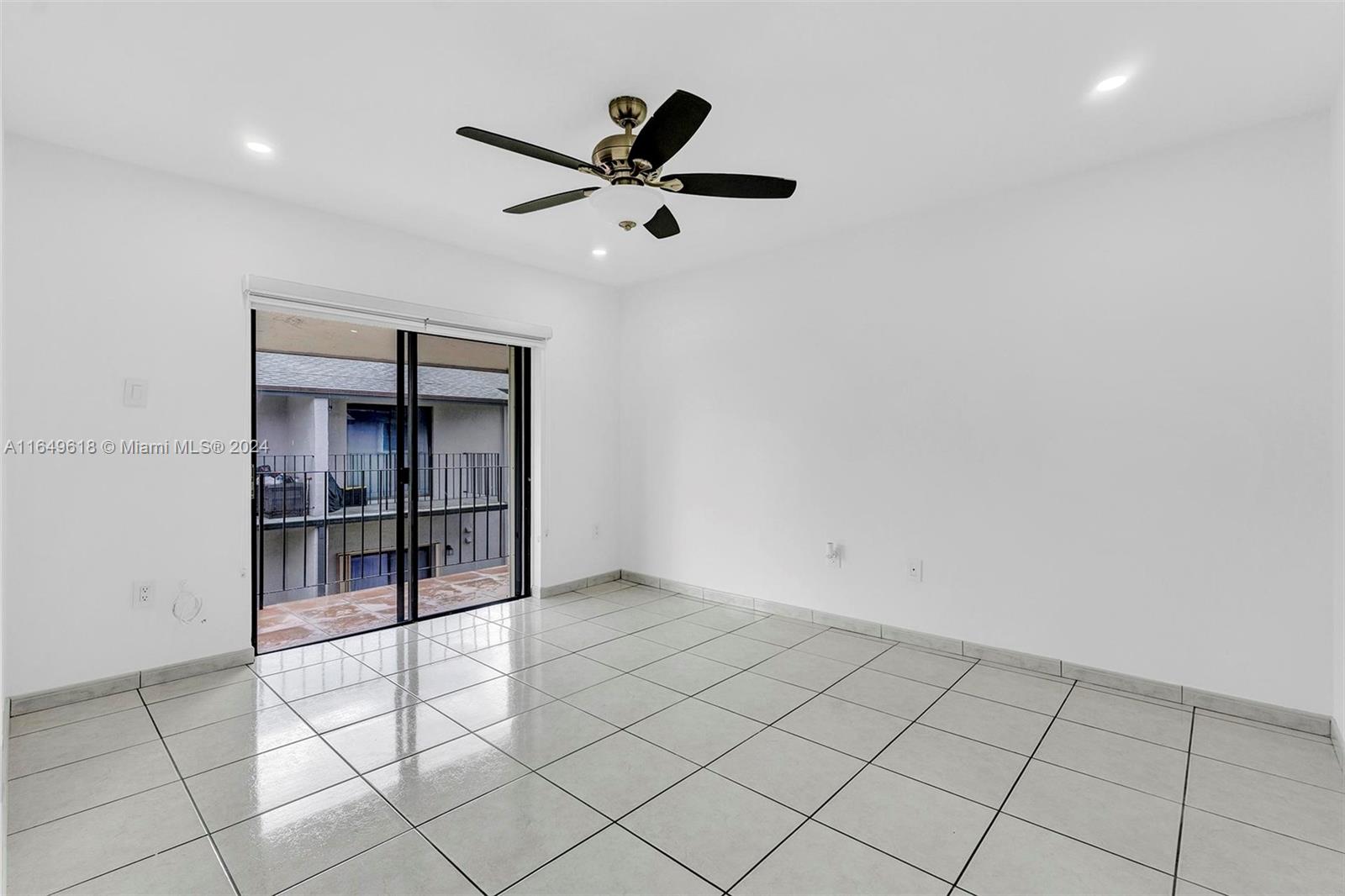 13240 Southwest 17th Lane, Unit 8 Miami, FL 33175 - Photo 9 of 14 a view of an empty room