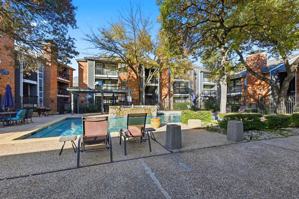 18333 Roehampton Drive, Unit 716 Dallas, TX 75252 - Photo 22 of 24 a view of a house with backyard porch and sitting area